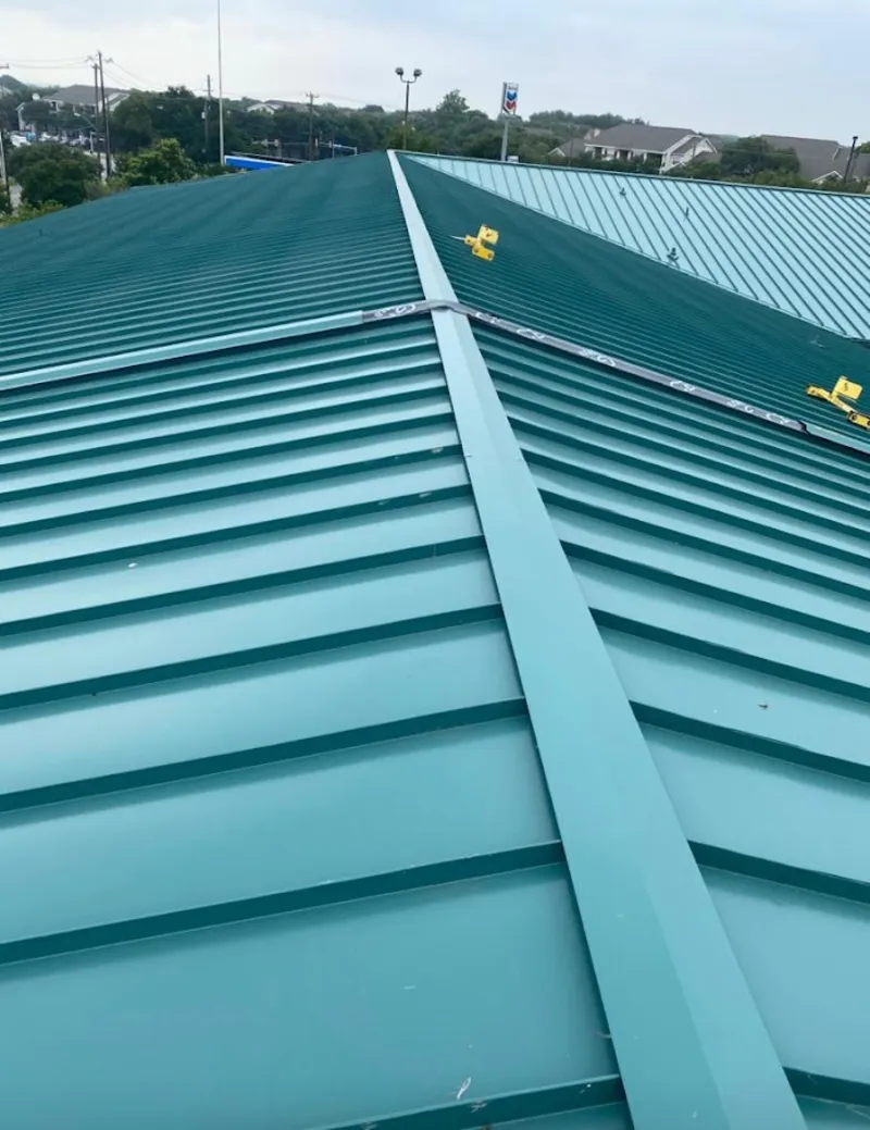 Green commercial metal roof ridge and valley for Metal Roof Repair in Linton Hall