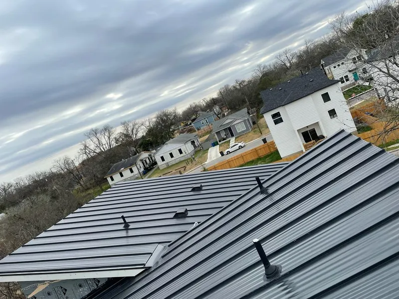 Standing seam metal roof panels with vents for Skylight Repair in Linton Hall